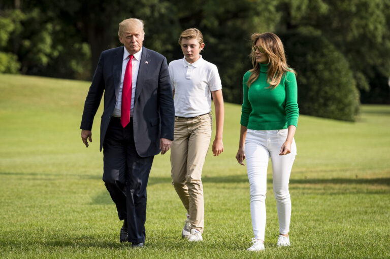 Barron Trump's Subtle Gesture in Family Photos Raises Questions